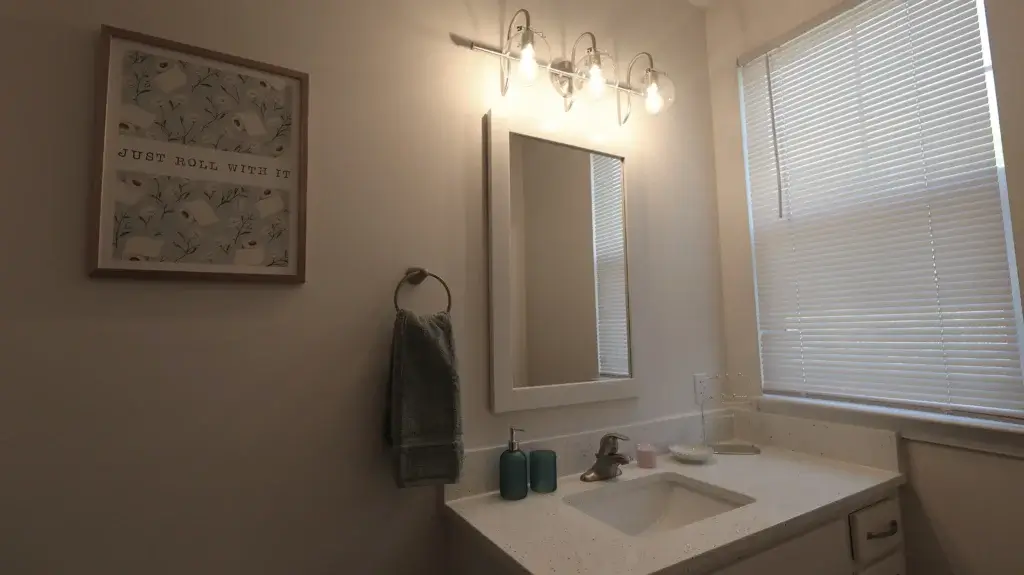 Bright Bathrooms with Modern Lighting and Stylish Quartz Countertops Image
