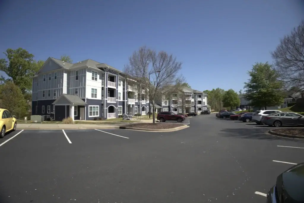 Enjoy Spacious Community Living with Modern Buildings and Convenient Resident Parking Image