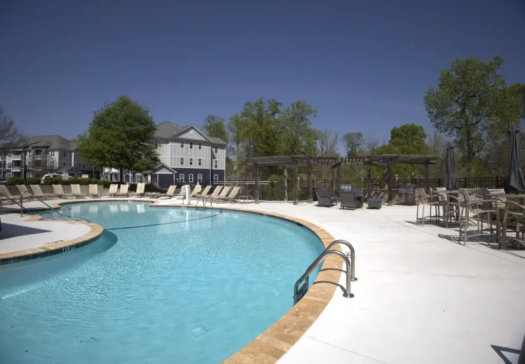 Relax Poolside with Spacious Lounge Seating and Resort-Style Community Amenities Image