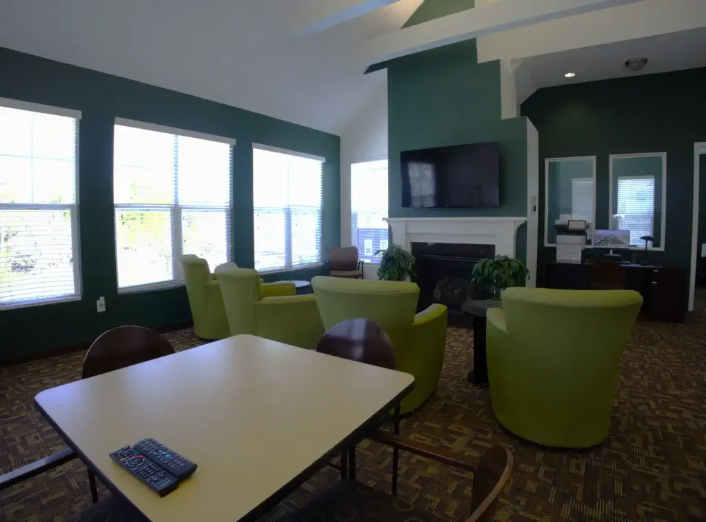 Resident Lounge with Fireplace, Comfortable Seating, and Spaces to Relax or Gather Image