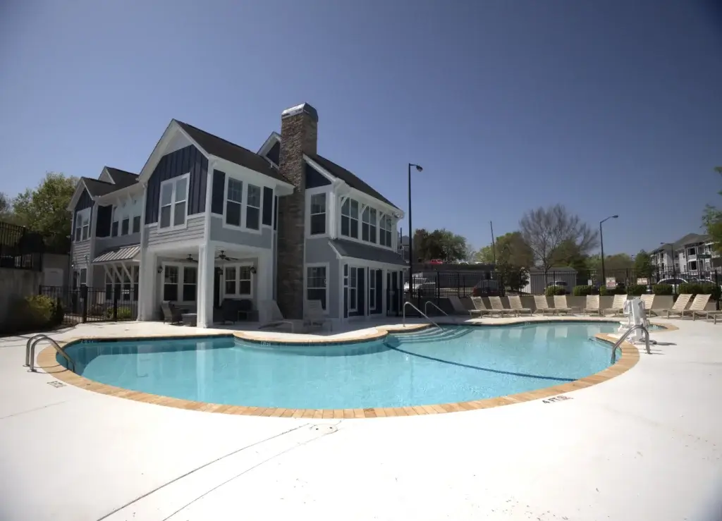 Resort-Style Pool with Expansive Sundeck and Relaxing Community Lounge Areas Image