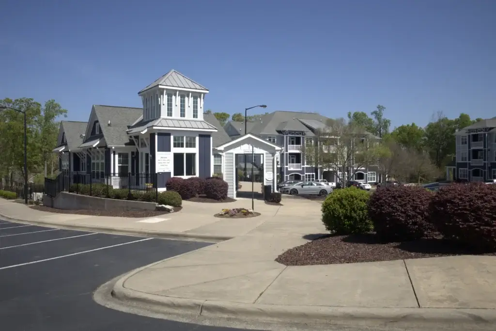 Welcome Home to Walden Station’s Beautifully Designed Clubhouse and Community Entrance Image